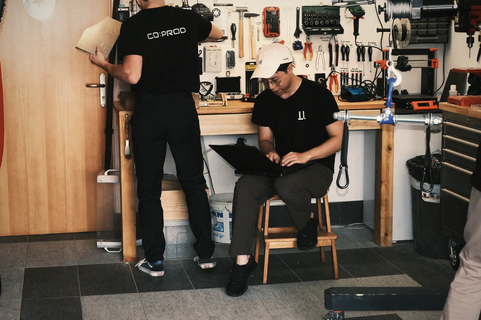 Three founders at work in the coprod workshop