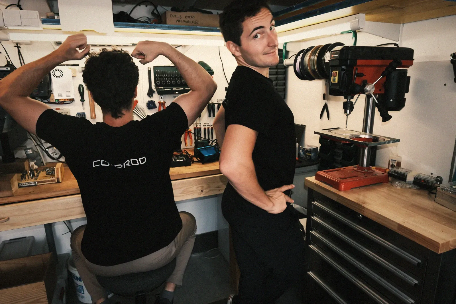 Coprod team joking at the workbench